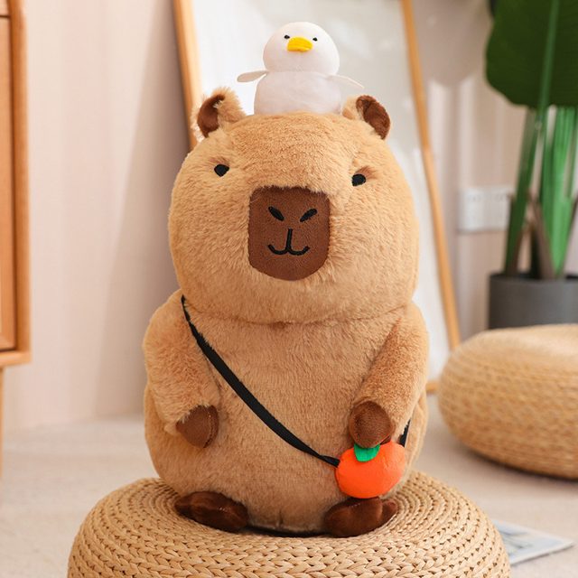 Sitting Capybara Plush With Duck Buddy โ photo 2