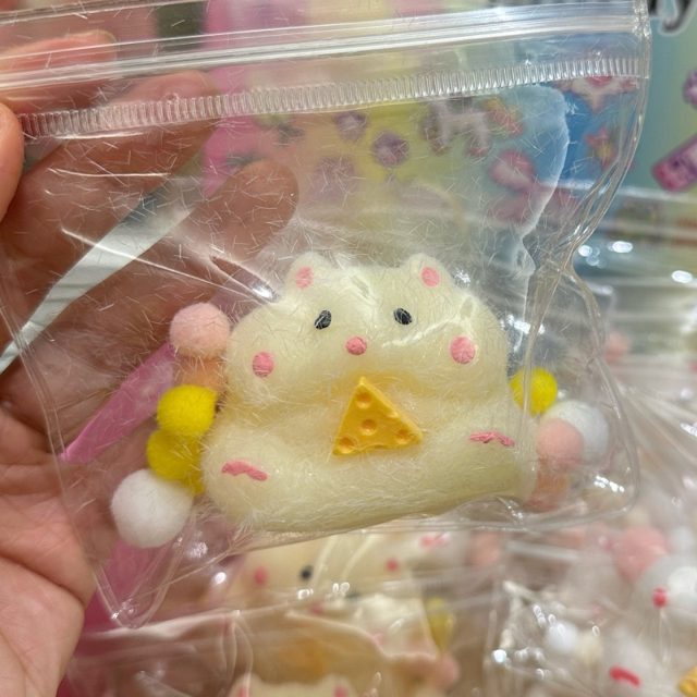 Fuzzy Cat With Cheese Squishy