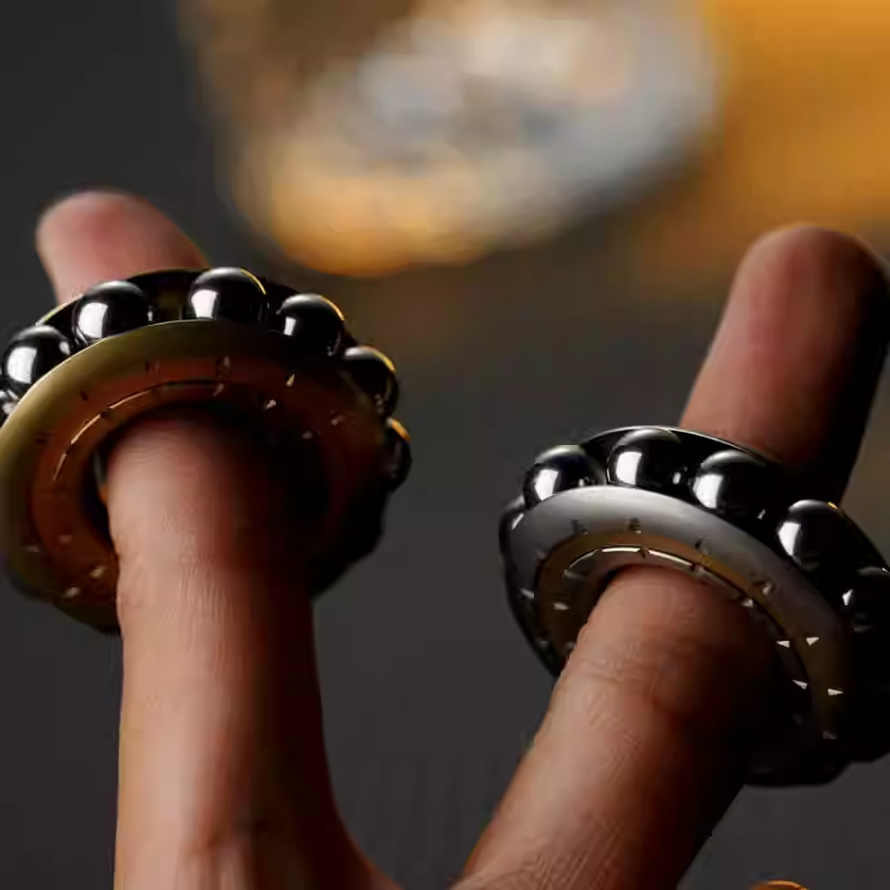 Mechanical Spinning Bead Fidget Top โ photo 2