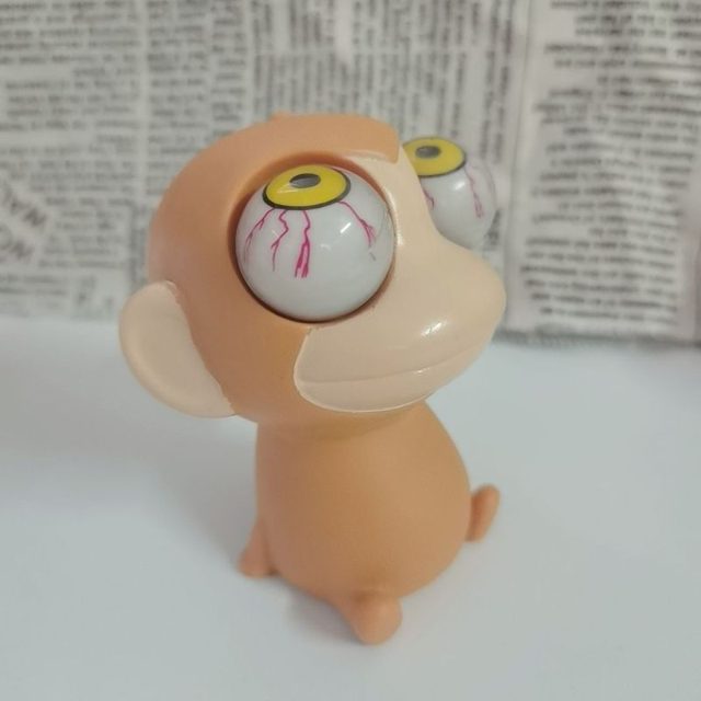 Pop-Eye Monkey Squeeze Toy
